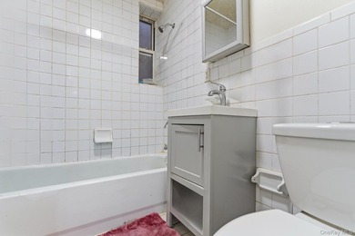 Exceptional brownstone six-unit multi-family building offering a - photo 4