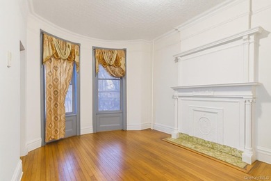 Exceptional brownstone six-unit multi-family building offering a - photo 6