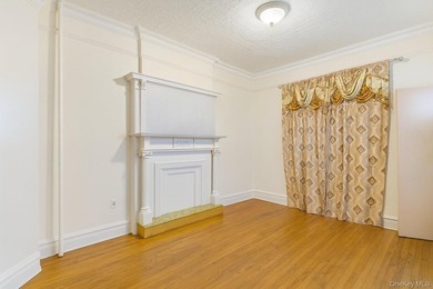 Exceptional brownstone six-unit multi-family building offering a - photo 7