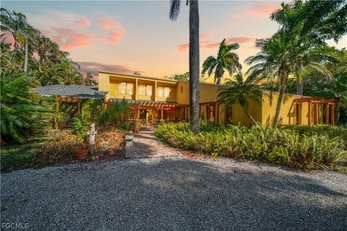 Discover a serene 1.7-acre retreat of lush, fully gated gardens - photo 1