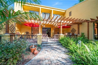 Discover a serene 1.7-acre retreat of lush, fully gated gardens - photo 4