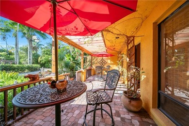 Discover a serene 1.7-acre retreat of lush, fully gated gardens - photo 5