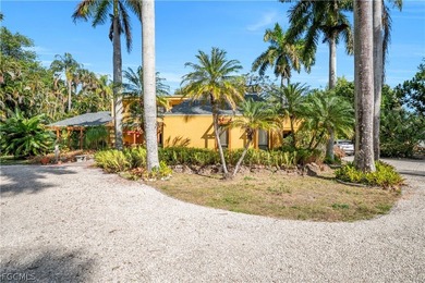 Discover a serene 1.7-acre retreat of lush, fully gated gardens - photo 8