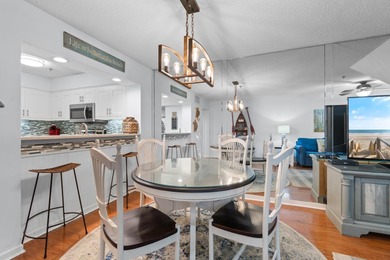 This move-in ready, updated two-bedroom, two-bath condo features