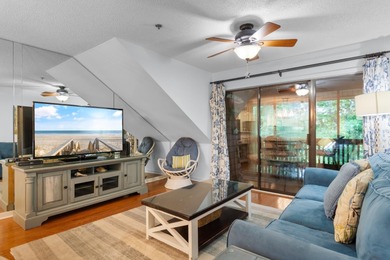 This move-in ready, updated two-bedroom, two-bath condo features