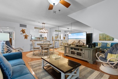 This move-in ready, updated two-bedroom, two-bath condo features