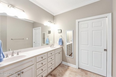 Welcome to this stunning, custom-built 2020 brick home in a