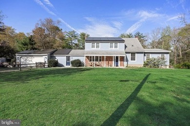 Welcome to this spacious 5-bedroom, 2.5-bath home nestled in the - photo 1