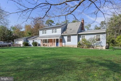 Welcome to this spacious 5-bedroom, 2.5-bath home nestled in the - photo 2