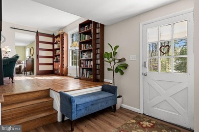Welcome to this spacious 5-bedroom, 2.5-bath home nestled in the - photo 6