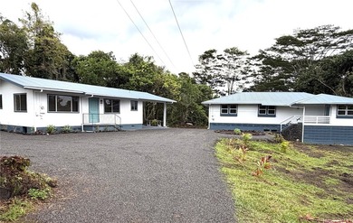 Two beautifully renovated homes are nestled on a cleared and - photo 1