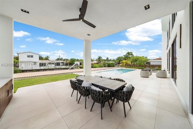 Brand-new waterfront modern estate in the gated Enchanted Lake - photo 16