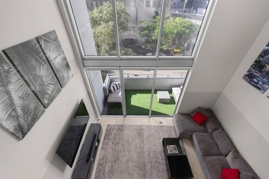Experience true loft living in the heart of Brickell with this