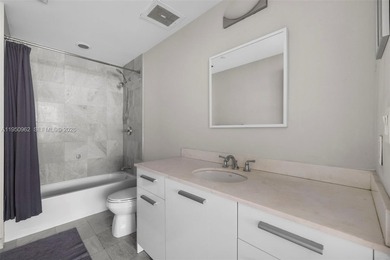 Experience true loft living in the heart of Brickell with this