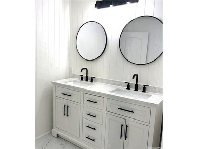 Two beautifully renovated homes are nestled on a cleared and - photo 10