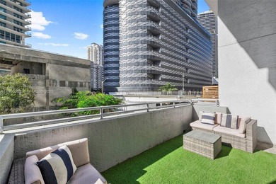 Experience true loft living in the heart of Brickell with this