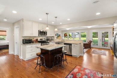 This classic New England Cape Cod is nestled just a short walk - photo 12