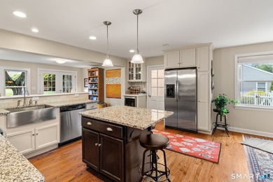 This classic New England Cape Cod is nestled just a short walk - photo 15