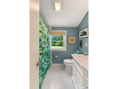 This classic New England Cape Cod is nestled just a short walk - photo 28