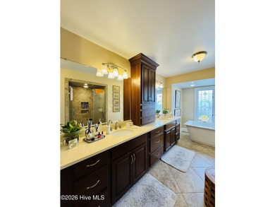 Nestled on a stunning waterfront property, this spectacular home - photo 29