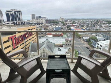 Corner unit with OCEAN AND BAY VIEWS!! Sit on your balcony and - photo 3