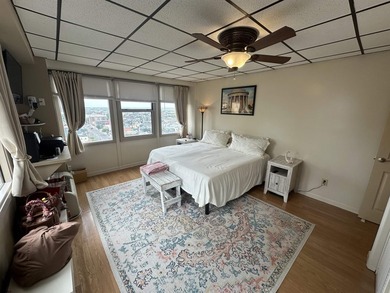 Corner unit with OCEAN AND BAY VIEWS!! Sit on your balcony and - photo 7