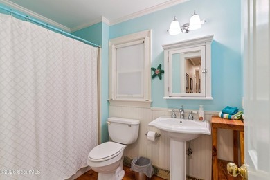 Check out this unique beach cottage in the south end! Enjoy the - photo 16