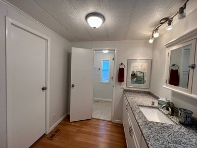 This incredible riverfront home at 327 3rd St Dr W #11 in - photo 34