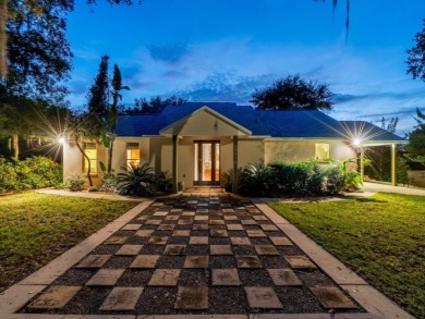 Situated on 2.19 acres with 200 feet of waterfront on Little - photo 2