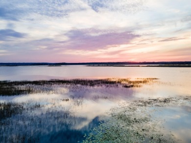 Situated on 2.19 acres with 200 feet of waterfront on Little - photo 6