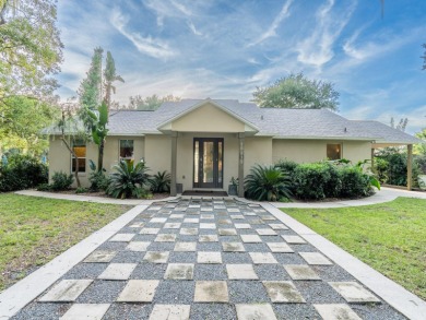 Situated on 2.19 acres with 200 feet of waterfront on Little - photo 7