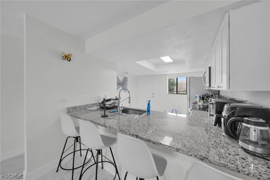 Discover this well-maintained end-unit condo offering comfort - photo 12