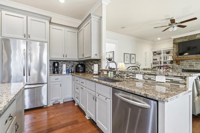 Enjoy breathtaking main lake views from this charming custom - photo 27