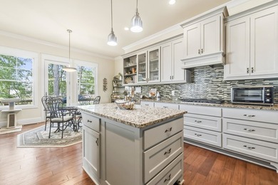 Enjoy breathtaking main lake views from this charming custom - photo 28