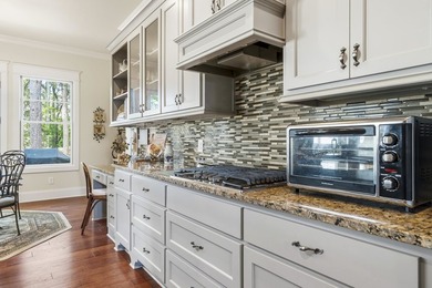 Enjoy breathtaking main lake views from this charming custom - photo 29