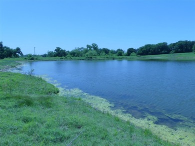 135 acres of gently rolling north Texas pastureland. The almost - photo 31