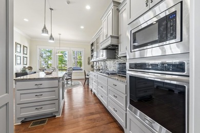Enjoy breathtaking main lake views from this charming custom - photo 32