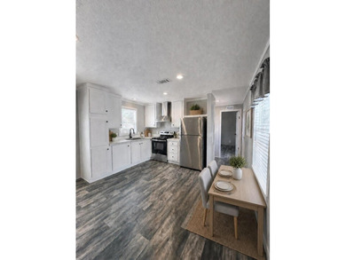 Virtually Staged. BRAND NEW, MODERN HOME! And you own the lot - - photo 4