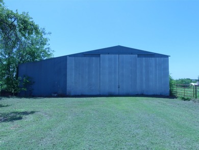 135 acres of gently rolling north Texas pastureland. The almost - photo 38
