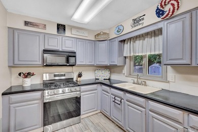 Spacious 3-bedroom, 1-bath ranch ideally located just minutes - photo 3