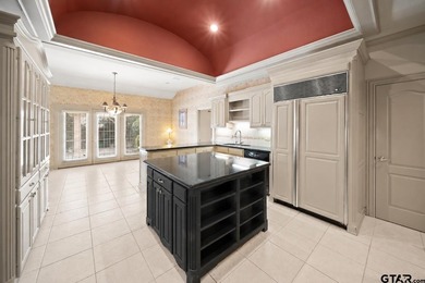 Welcome to 7402 Hollytree Dr., an exceptional estate situated on - photo 10