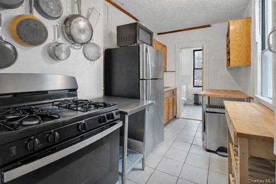 Welcome to 584 Sterling Place, a classic three-family townhouse - photo 12