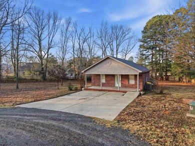Charming home on over an acre in the heart of Cabot! Welcome to