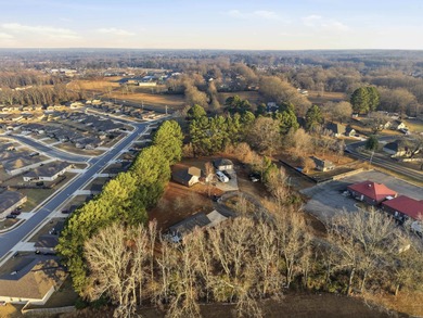 Charming home on over an acre in the heart of Cabot! Welcome to