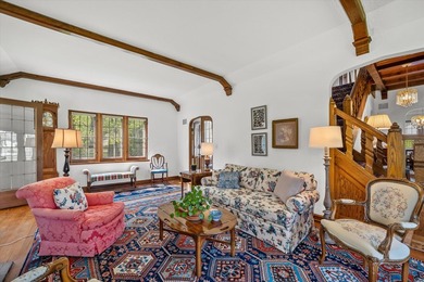 This stately stone Tudor is located east of Lake Drive, just - photo 12