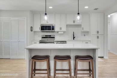 Coastal charm meets modern convenience in this beautifully - photo 14
