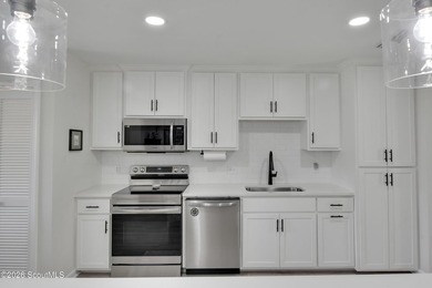 Coastal charm meets modern convenience in this beautifully - photo 16