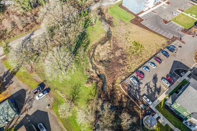 Enjoy 1.15 level acres with a creek running through it, right in - photo 18