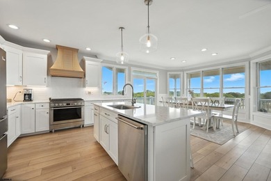 Stunning first-floor beachfront condo ideally positioned on a - photo 2