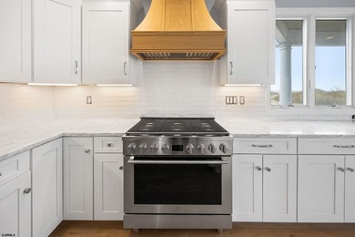 Stunning first-floor beachfront condo ideally positioned on a - photo 5